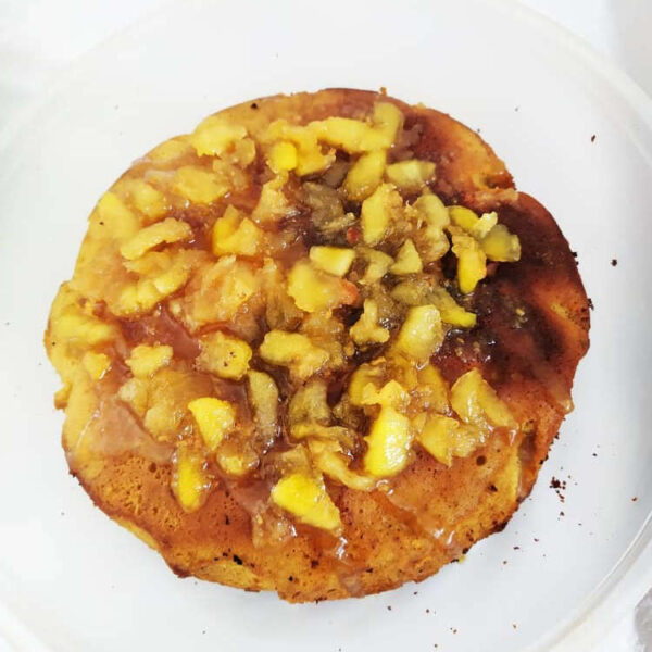 pineapple cake with pineapple pieces inside and caramelized pineapple on the outside